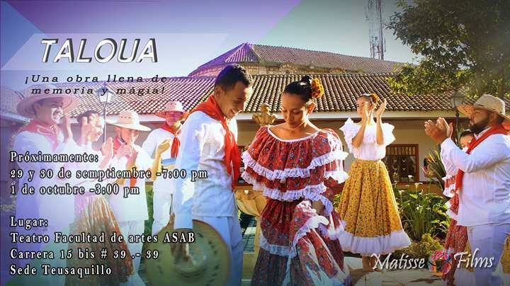 Personas en traje típico en medio de un pueblo